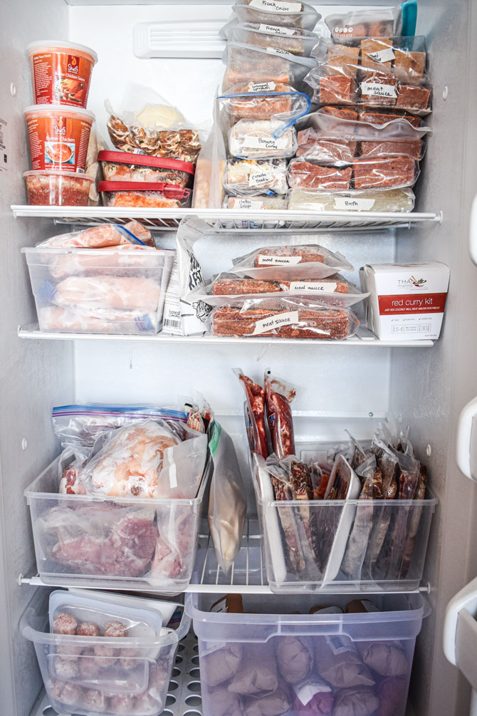 secondary freezer filled with freezer meals