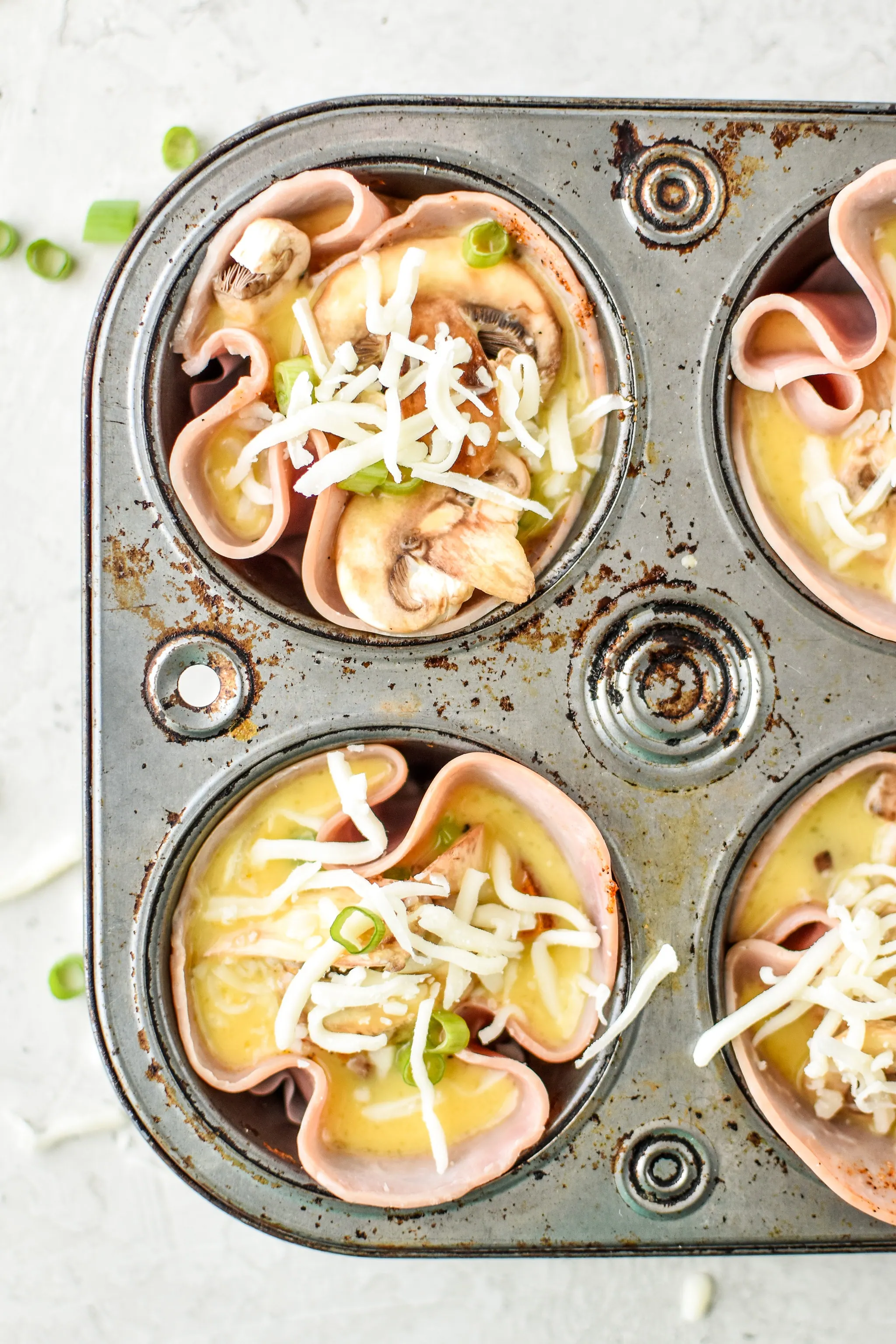 https://mealplanaddict.com/wp-content/uploads/2018/06/5-ham-egg-cups-before-baking.jpg