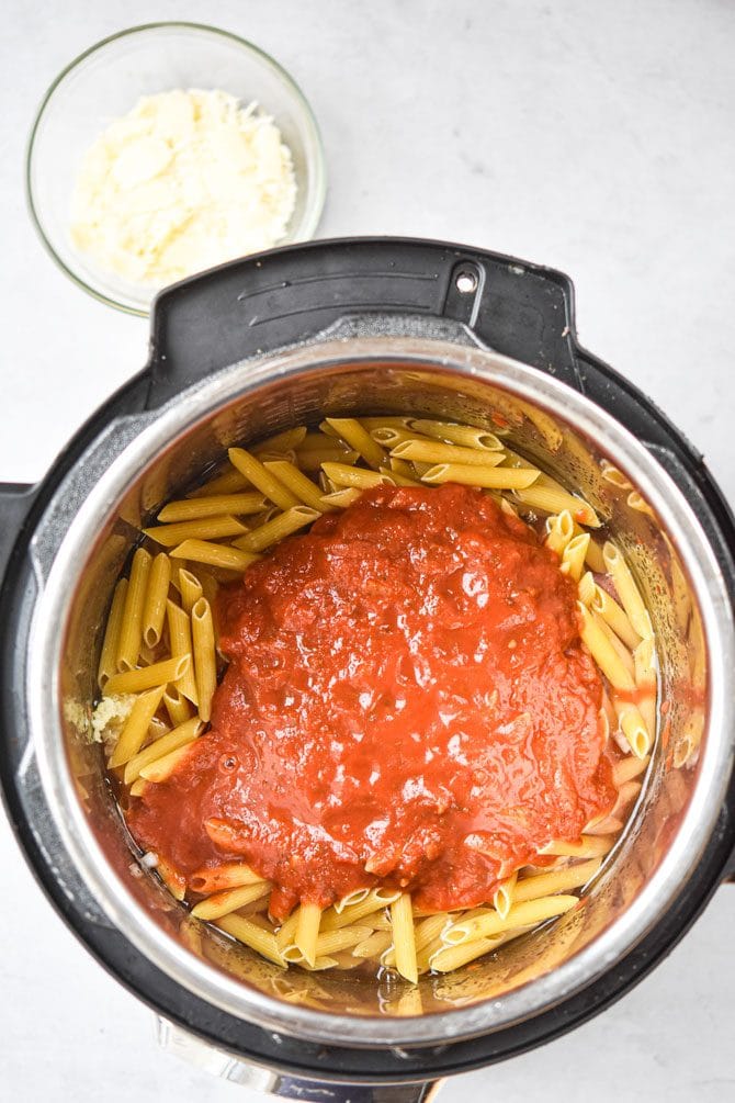 nstant Pot Chicken Parm Pasta sauce on top noodles