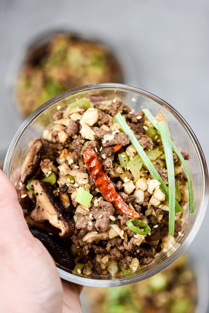 Kung Pao Beef & Cauliflower Rice Bowls close up on light background