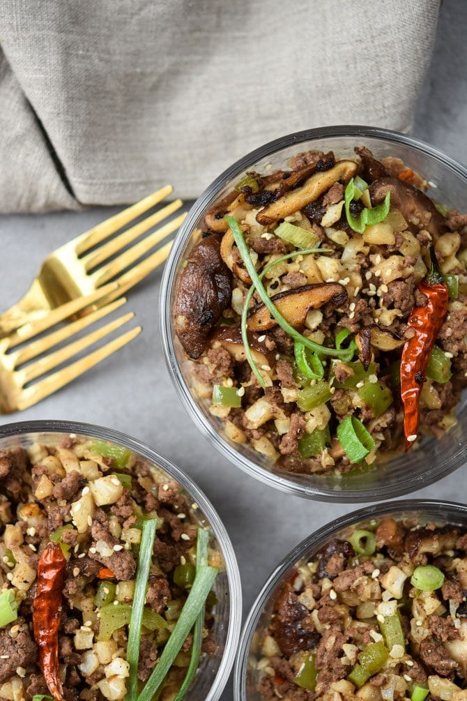 Kung Pao Beef & Cauliflower Rice Bowls with forks hero shot