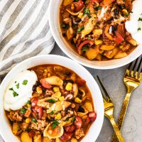 Easy Instant Pot Taco Pasta two bowls and golden forks