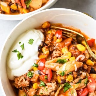 Easy Instant Pot Taco Pasta two bowls close up shot with fork