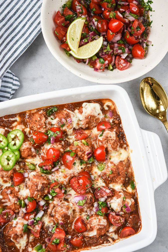 Instant Pot Mexican Meatballs out of oven with spoon