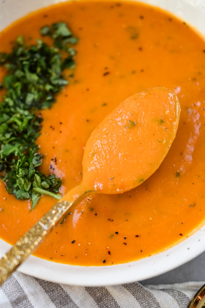 Simple Instant Pot Tomato Basil Soup on spoon