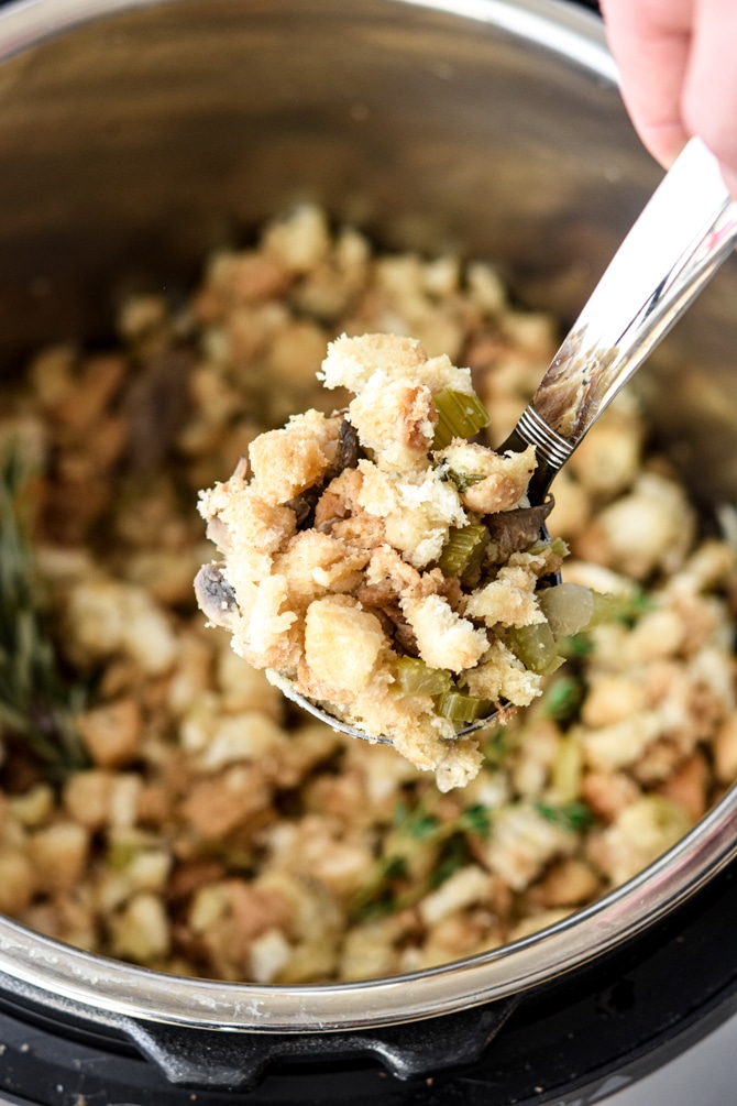Instant Pot Stuffing finished close up on a laddle