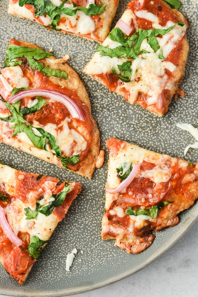 Low carb pizza crusts cooked on a plate