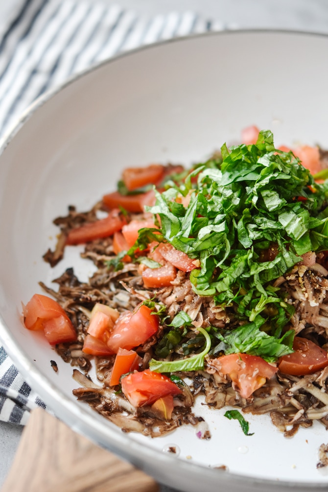 grated mushrooms in pan for quinoa scramble muffins