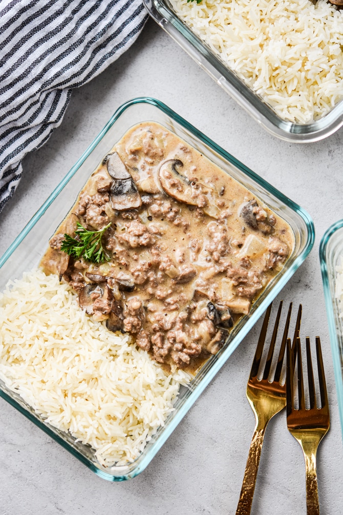 ground beef stroganoff in one container with linen