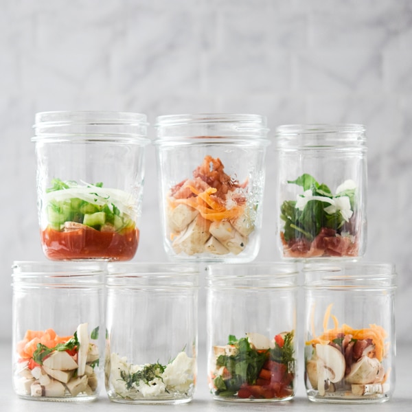Stacked mason jar omelette jars with ingredients